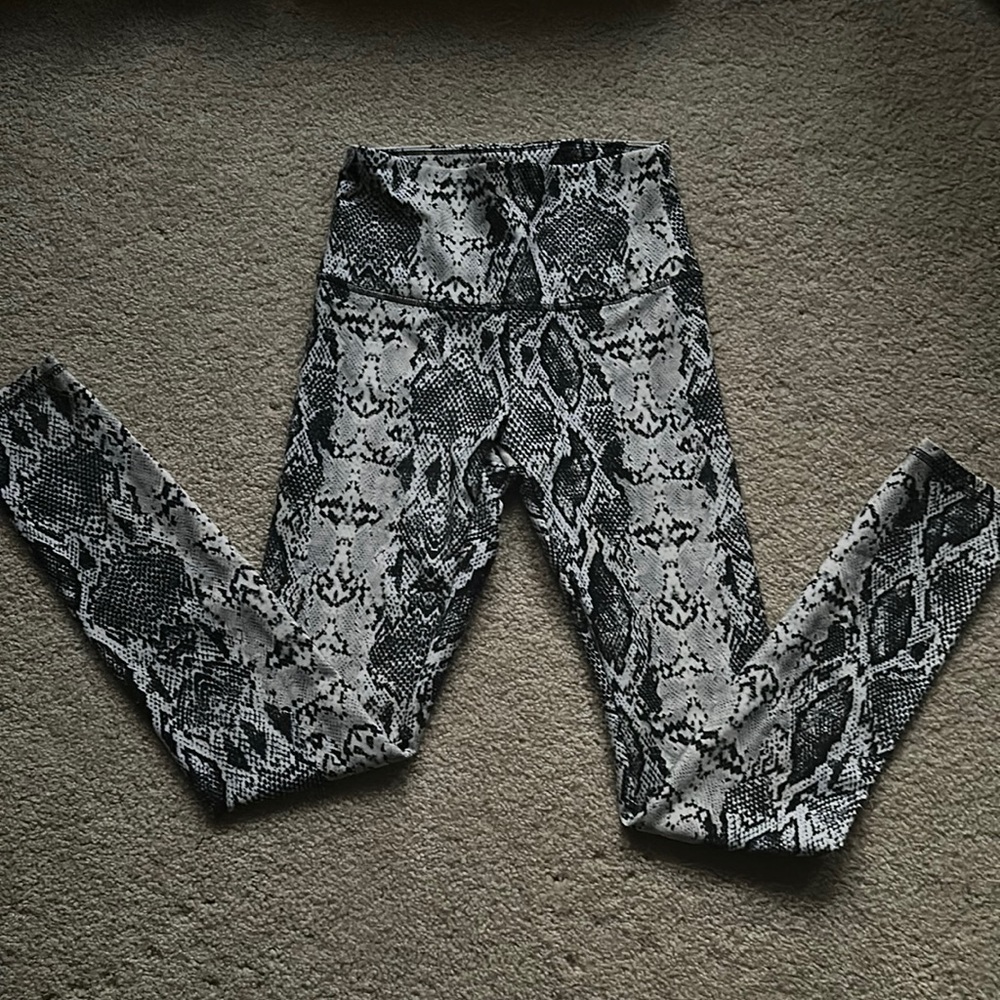 Woman’s lizard print workout leggings
